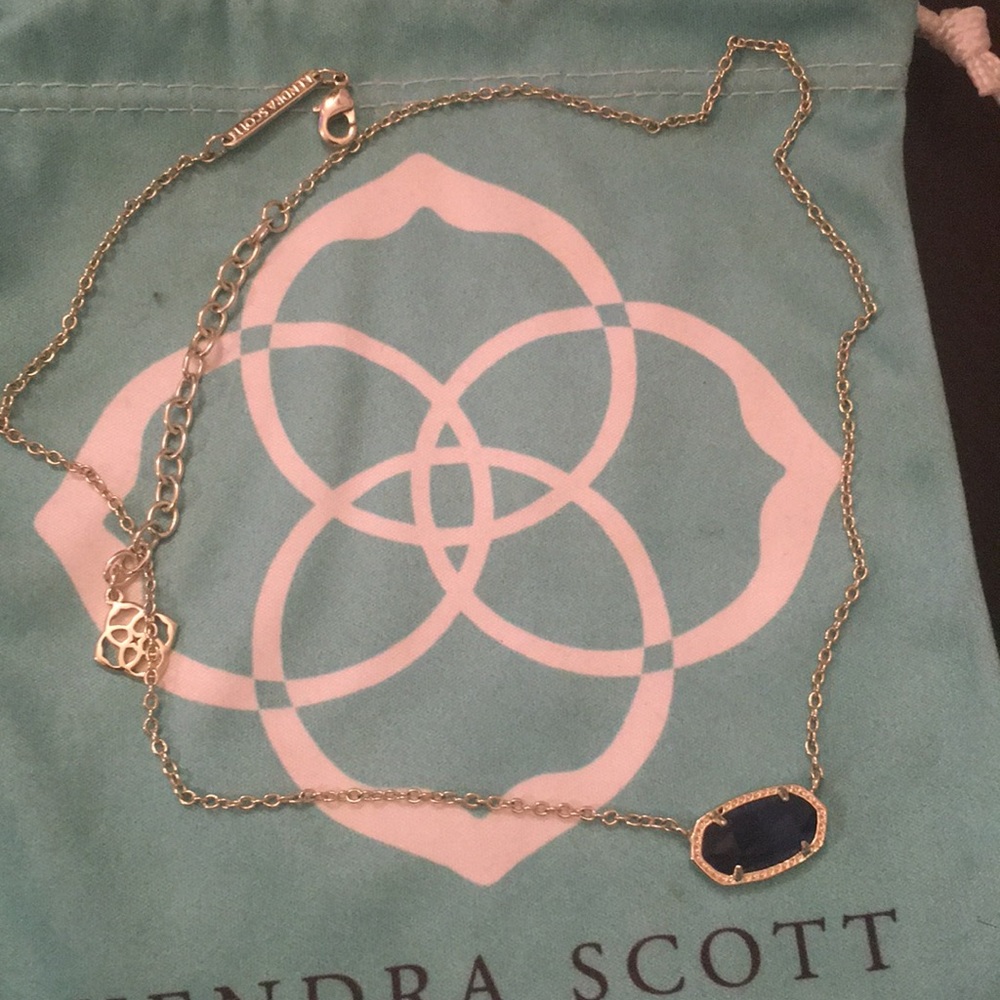 Kendra Scott Gold chain with Royal blue stone.